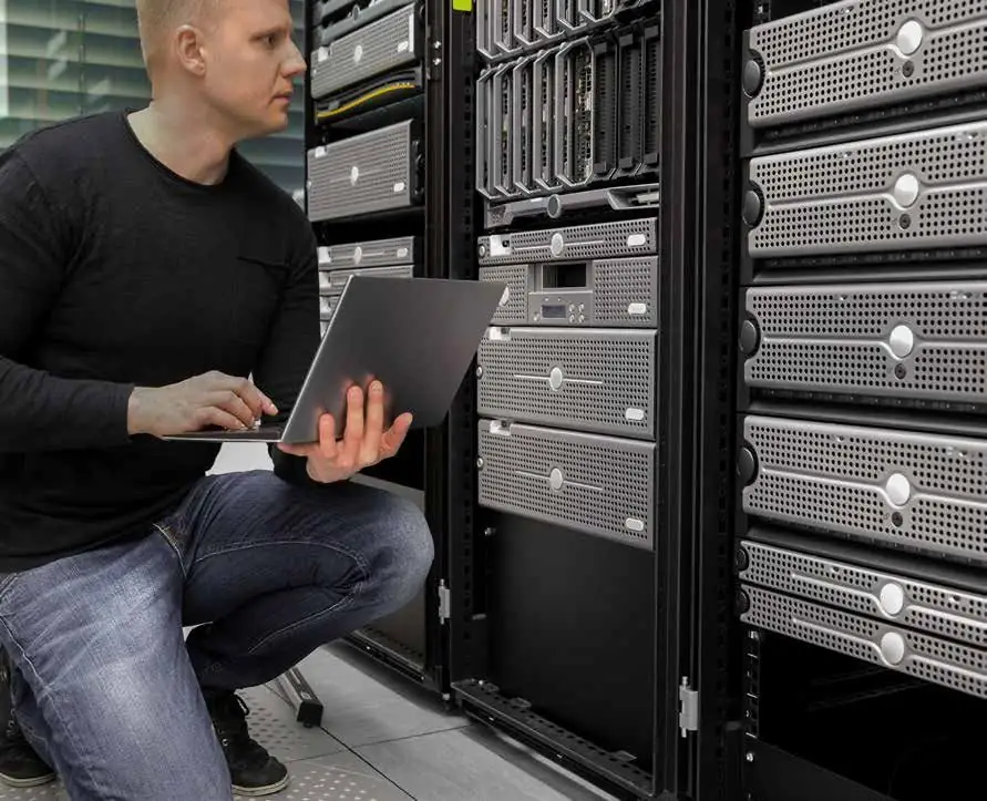 Technician working in a server room