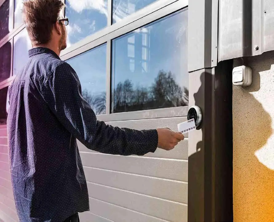 Employee badging in with an access card