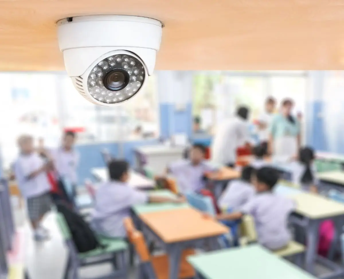 Dome security camera above a classroom